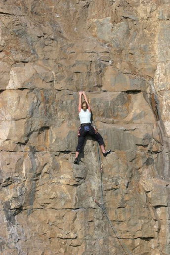 A climber on a rock face