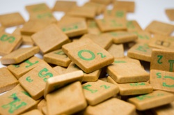 some mixed up scrabble tiles