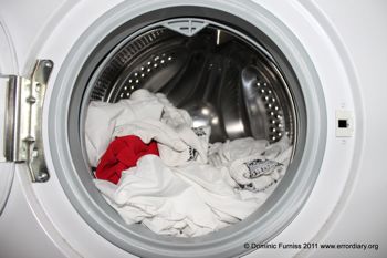 Red sock in a washing machine: image by Flikr user Dom Furniss