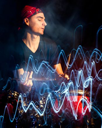 Drummer making patterns with drum sticks: copyright istock.com 19434894