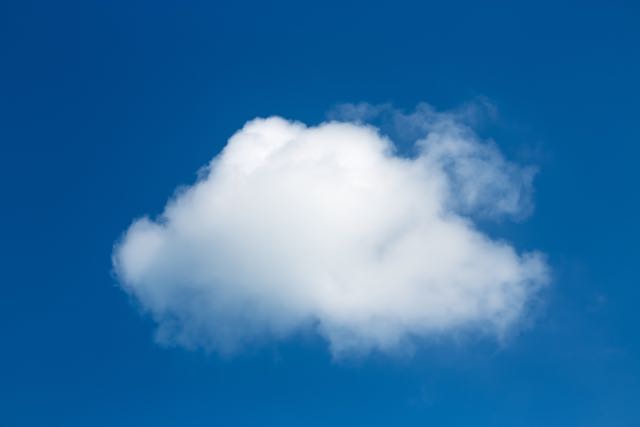 A fluffy cloud in a blue sky: copyright www.istockphoto.com 48379442