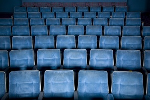 A bank of blue cinema seats