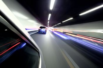 Cars in a tunnel: Copyright www.istock.com id 20499355
