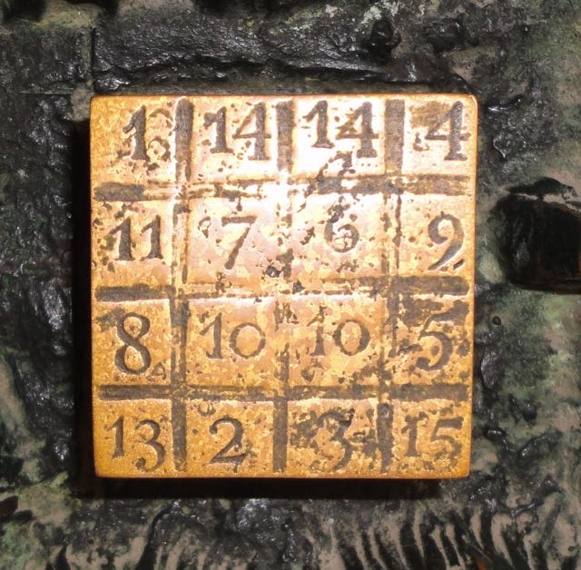 an ancient, golden magic square