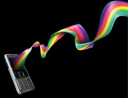 a mobile phone with a rainbow emerging from the screen