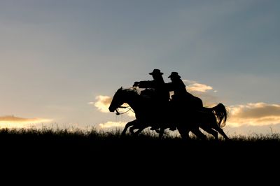 Pony Express racing across hilltop