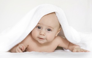 Baby under towel