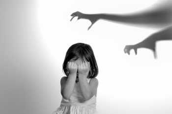 A monstery shadow toward a little girl