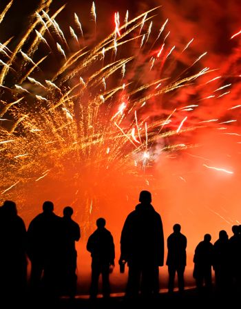 A crowd watching fireworks