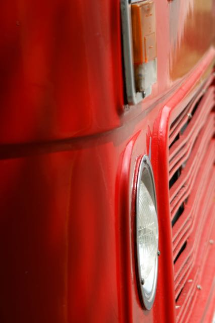 A red bus headlight