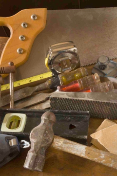 A pile of tools with sandpaper