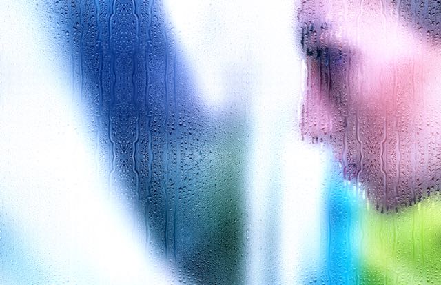 You watch a sad woman through a rainy window. From PIXABAY.com