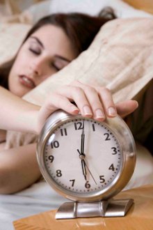 A woman hitting the alarm at 5:15