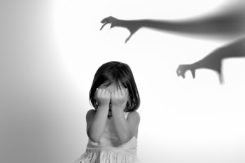 A monstery shadow toward a little girl
